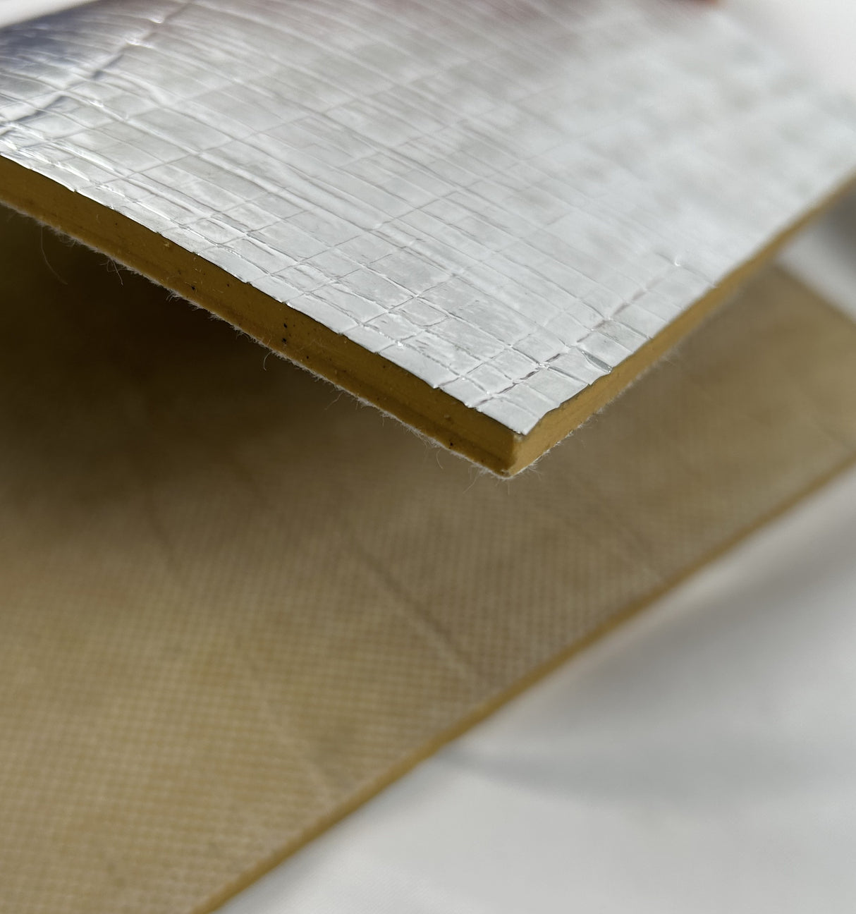 Siderise Barrier Pro Foil Faced Acoustic Barrier Mat showing the thickness of the product