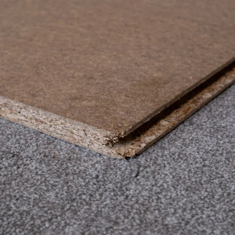 Close-up product image of loft board on a grey background