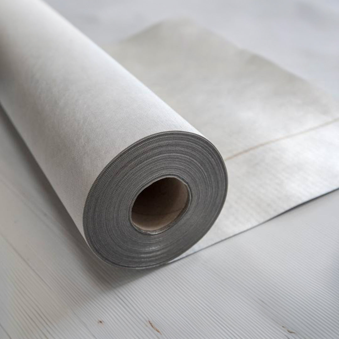 A roll of Novia reflex displayed on a white wooden floor