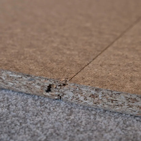 Close-up product image of loft board on a grey background