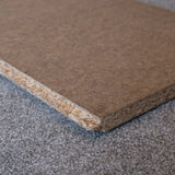 Close-up product image of loft board on a grey background