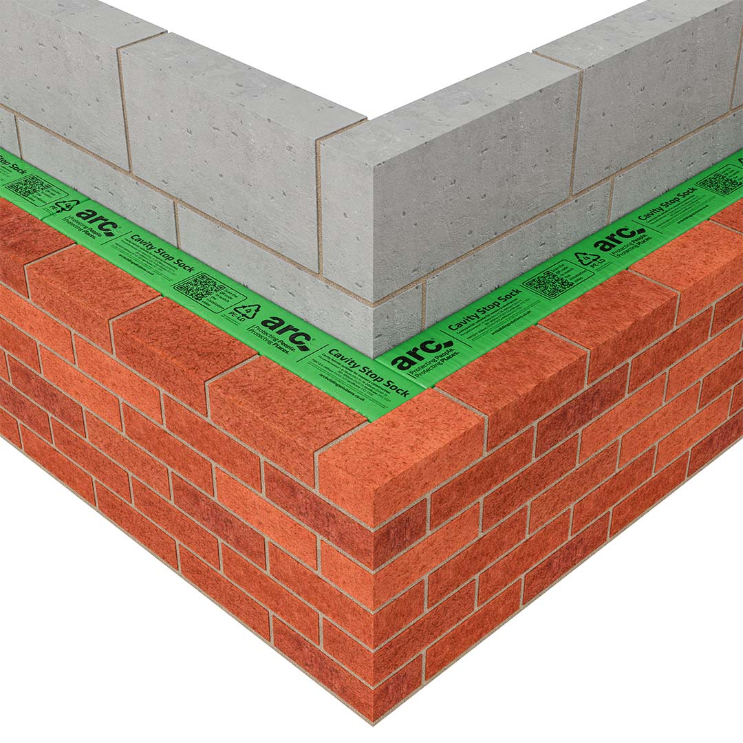 ARC Cavity Stop Sock shown in-between a brick wall